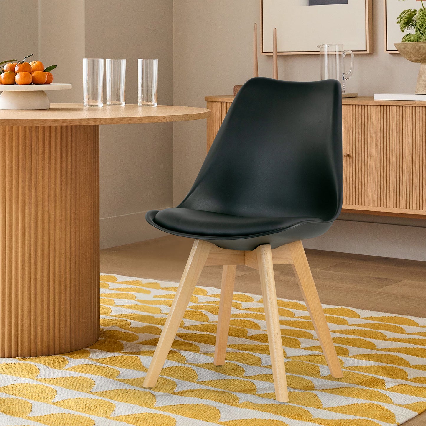 Balint Black Cushioned Plastic Dining Chairs