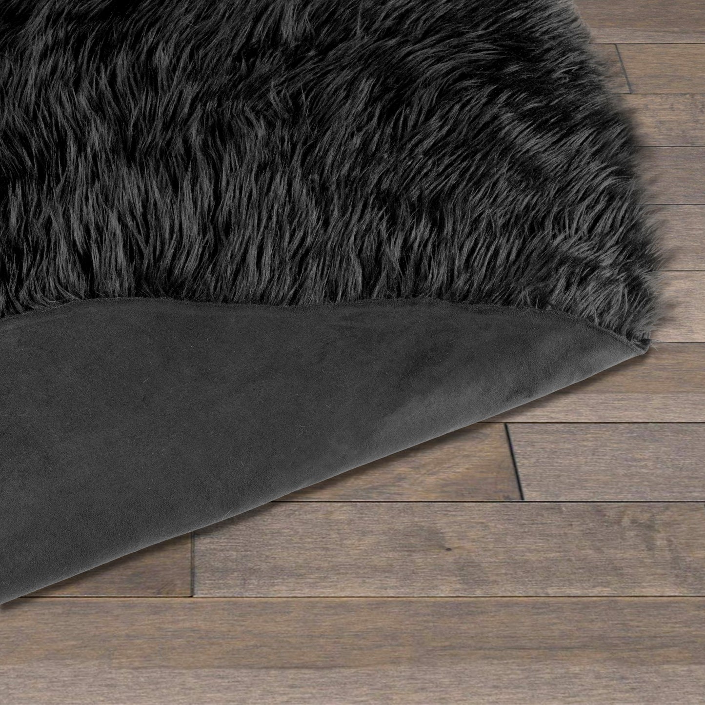 Alair Black Round Faux Fur Area Rug 5 Foot Wide