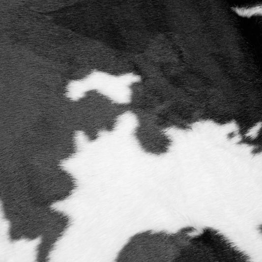 Alecia Faux Cowhide Black and White Area Rug 68 inch by 50 inch